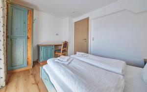 Postel nebo postele na pokoji v ubytování TownHouse Appartements