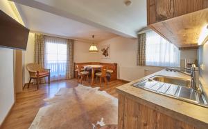 Kuchyň nebo kuchyňský kout v ubytování TownHouse Appartements