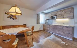 Kuchyň nebo kuchyňský kout v ubytování TownHouse Appartements