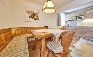 Posezení v ubytování TownHouse Appartements