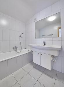 Koupelna v ubytování TownHouse Appartements