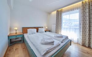 Postel nebo postele na pokoji v ubytování TownHouse Appartements