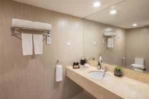 Vannituba majutusasutuses Rocana Hotel