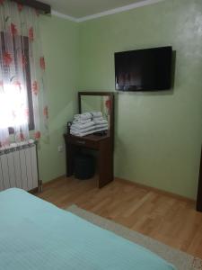 Clinic for Rehabilitation Vujan客房内的一张或多张床位