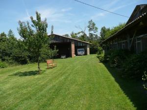 Larrazetにあるle Pigeonnier de Migouの建物前の庭 +11枚の写真