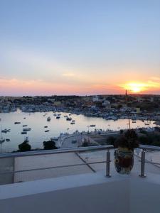 a view of a harbor with boats in the water at B&B Giro Di Boa in Lampedusa