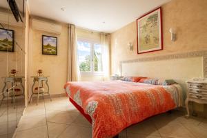 Säng eller sängar i ett rum på Villa Noria