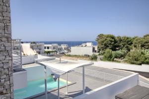 The swimming pool at or close to Jacuzzi Holiday Homes by LoveSud