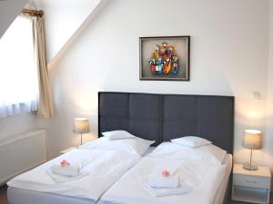 Posteľ alebo postele v izbe v ubytovaní Hotel U Brány