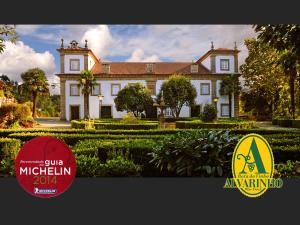 a picture of a large house with a yard at Solar de Serrade in Monção