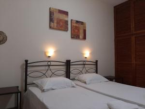 Ένα ή περισσότερα κρεβάτια σε δωμάτιο στο Studio Lefteris