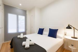 Posteľ alebo postele v izbe v ubytovaní Sitges Group Beach Dreams