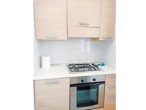A kitchen or kitchenette at Trilocale La Praja Gallipolitravel Még 1 kép