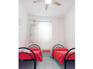 A bed or beds in a room at Trilocale La Praja Gallipolitravel