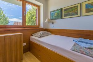 Postel nebo postele na pokoji v ubytování HAUS KATARINA