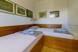 Postel nebo postele na pokoji v ubytování HAUS KATARINA
