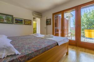 Postel nebo postele na pokoji v ubytování HAUS KATARINA