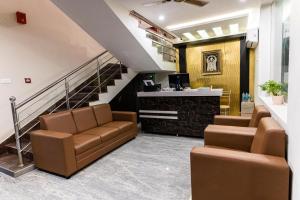 The lobby or reception area at Hotel Mookambika Comforts