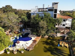 an aerial view of a pool at a resort at Los Lagos Resort Hotel in Capiatá