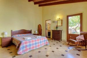 Ένα ή περισσότερα κρεβάτια σε δωμάτιο στο Villa Ca na Xaneta