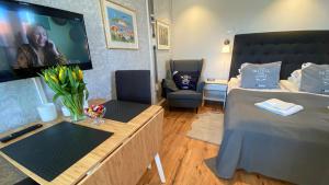 Posezení v ubytování Skaftö Hotell Villa Lönndal, Grundsund