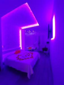 A bed or beds in a room at Il Mare di Roma Deluxe