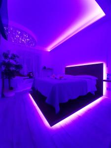 A bed or beds in a room at Il Mare di Roma Deluxe