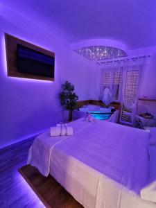 A bed or beds in a room at Il Mare di Roma Deluxe