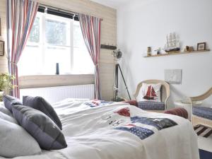 Katil atau katil-katil dalam bilik di Kolmårdsgården B&B