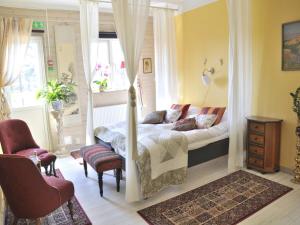 Katil atau katil-katil dalam bilik di Kolmårdsgården B&B