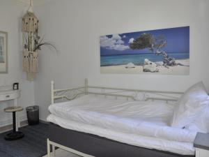 Katil atau katil-katil dalam bilik di Kolmårdsgården B&B