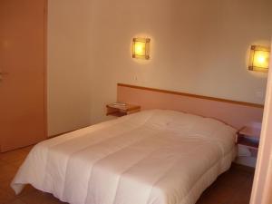 Postel nebo postele na pokoji v ubytování Lud'Hôtel + 37 fotografií