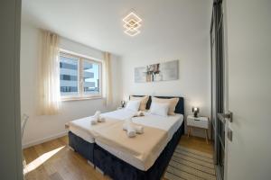 Ένα ή περισσότερα κρεβάτια σε δωμάτιο στο Apartment Astra