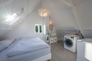 Postel nebo postele na pokoji v ubytování Villa Bo Junior