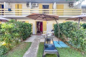 Vonkajšia záhrada v ubytovaní Residence Blu Marlin Natural beach