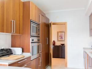 Η κουζίνα ή μικρή κουζίνα στο Apartment Panoramico by Interhome