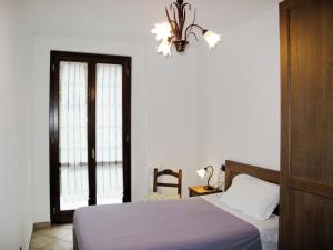 Posteľ alebo postele v izbe v ubytovaní Apartment Quercia - SBO100 by Interhome