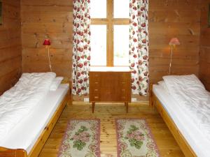 Ένα ή περισσότερα κρεβάτια σε δωμάτιο στο Holiday Home Elvehuset by Interhome