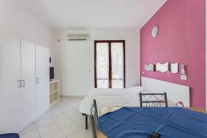 Posteľ alebo postele v izbe v ubytovaní Residence Blu Marlin Natural beach + 37 fotografií