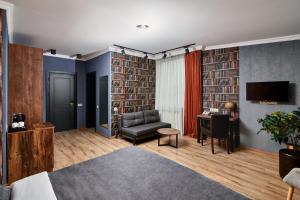 TV a/nebo společenská místnost v ubytování Hotel City