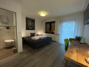 Postel nebo postele na pokoji v ubytování Hotel Hegemann garni