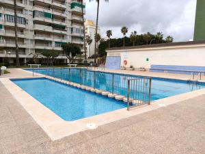 Bazén v ubytování Parque IV Solo Familias Serviplaya nebo v jeho okolí + 24 fotografií