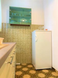 Kuchyň nebo kuchyňský kout v ubytování Roko apartment house