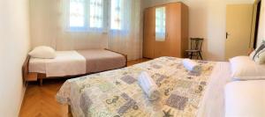 Postel nebo postele na pokoji v ubytování Roko apartment house