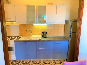 Kuchyň nebo kuchyňský kout v ubytování Roko apartment house