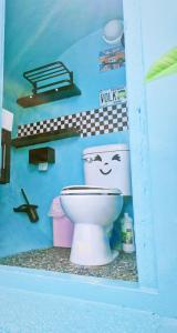 a toy bathroom with a toilet in a toy room at 與大自然融合的包棟小屋 in Hengchun