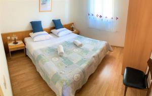 Postel nebo postele na pokoji v ubytování Roko apartment house