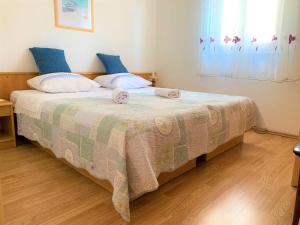 Postel nebo postele na pokoji v ubytování Roko apartment house