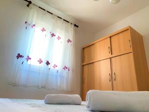 Postel nebo postele na pokoji v ubytování Roko apartment house