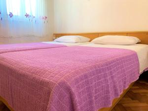Postel nebo postele na pokoji v ubytování Roko apartment house